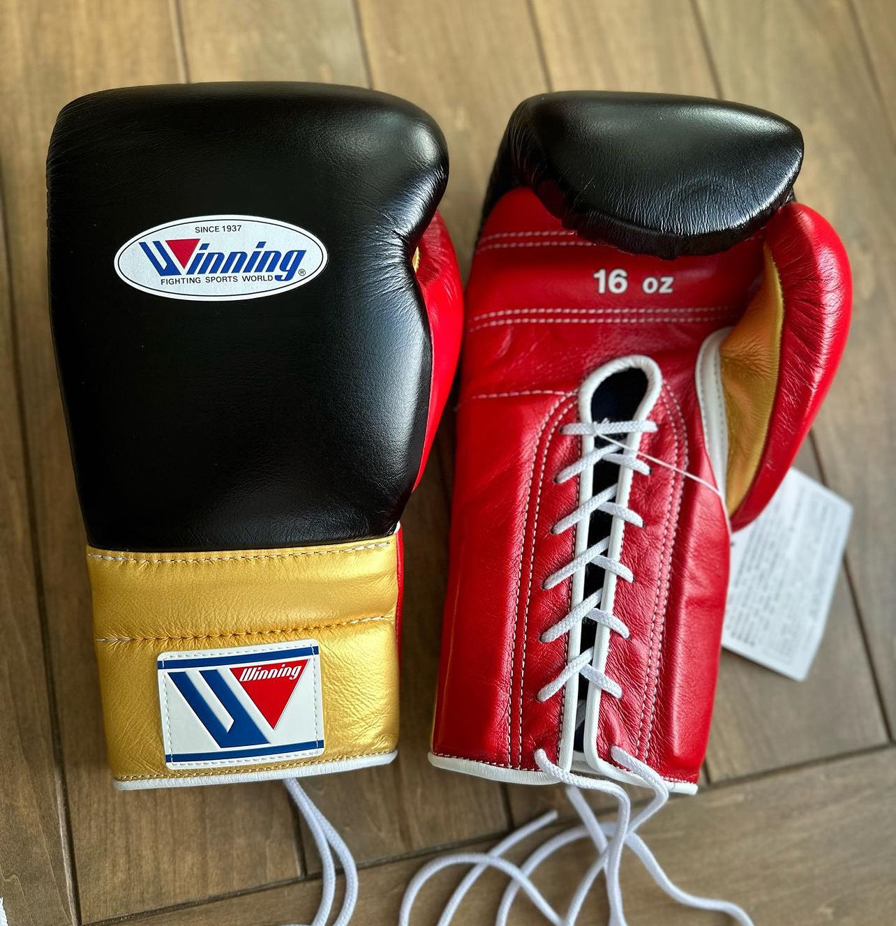 Winning Boxing Gloves - Black,Red and Golden Combination